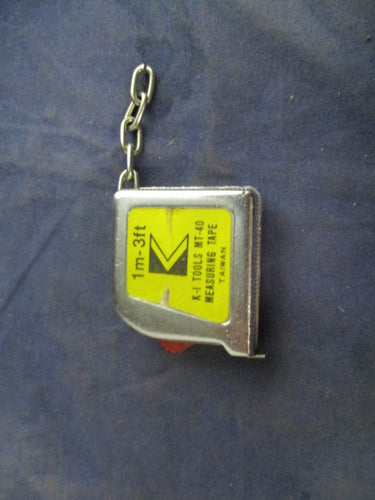 Used Pocket Key Chain Tape Measure