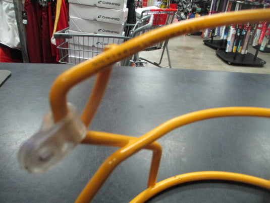 Used batting helmet mask in yellow with hardware