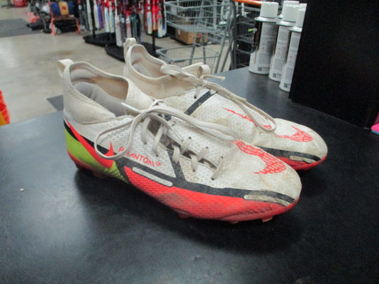 Used Nike Phantom youth Soccer cleats in white size 6Y Spikes are worn down