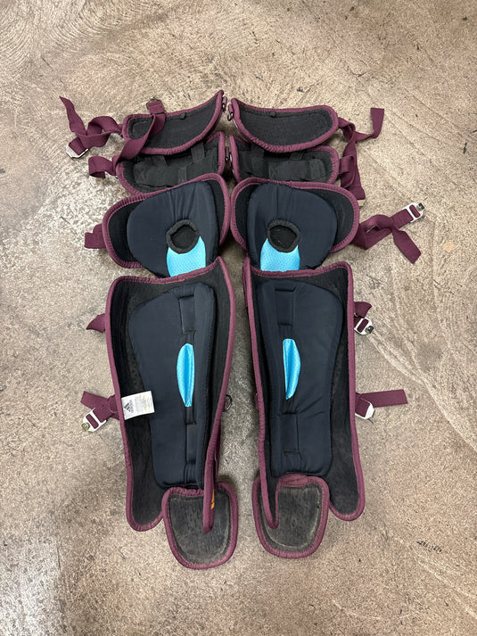 Used Adidas Pro Series Maroon and Gold 17 " Catcher Leg Guards