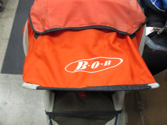 USED BOB JOGGING STROLLER (STRAPS NO GOOD)