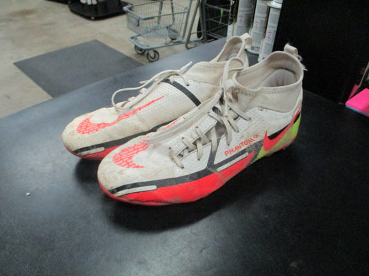 Used Nike Phantom youth Soccer cleats in white size 6Y Spikes are worn down
