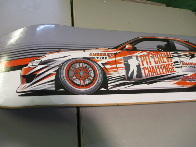Load image into Gallery viewer, Pit Crew Challenge Discount Tire 33&quot; Skateboard Deck
