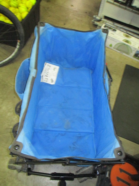 Load image into Gallery viewer, Used ozark trail Blue Wheeled Wagon
