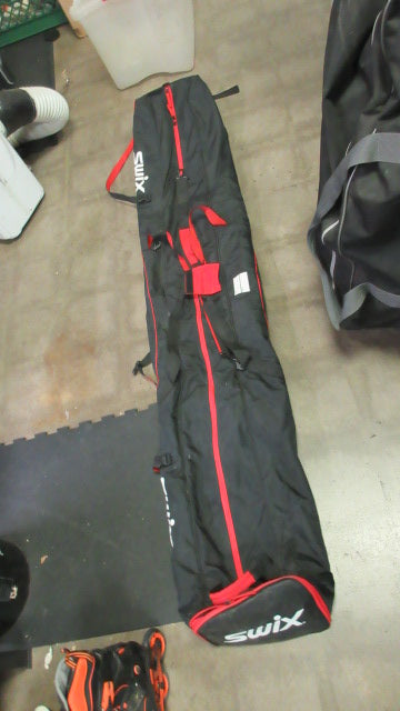 Load image into Gallery viewer, Used SWIX Wheeled Dual Ski Bag
