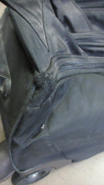 Load image into Gallery viewer, Used Callaway Golf Bag Travel Bag w/ Wheels - wear on corners &amp; cracked plastic
