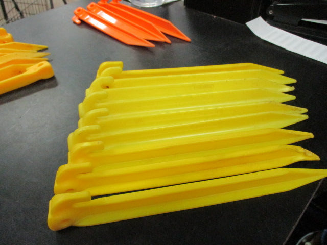 Load image into Gallery viewer, Used 9&quot; Yellow Tent Stakes - Set of 8
