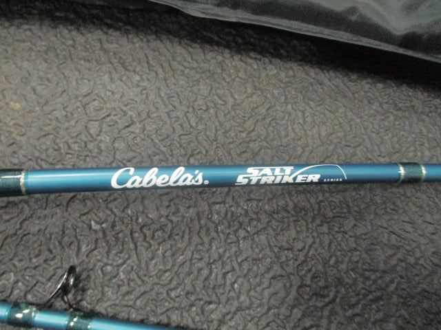 Load image into Gallery viewer, Used Cabelas salt Striker 7 Foot Spinning Rod  With Case
