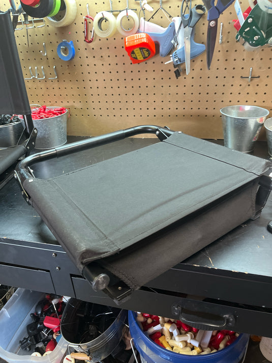 Used black folding stadium chair