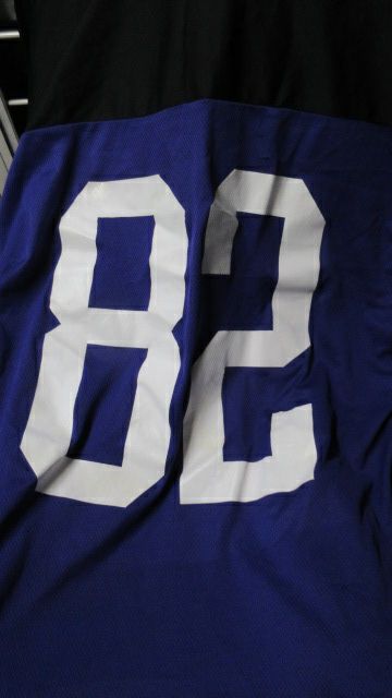 Used CCM Purple 82 Hockey Jersey Adult Size Medium - wear