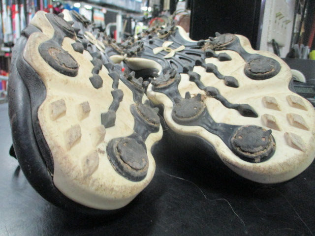 Load image into Gallery viewer, Used Under Amour Cleats in black size 11 wear to bottom spikes
