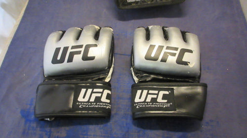 Used The Ultimate UFC MMA Gloves Size Large - heavily worn