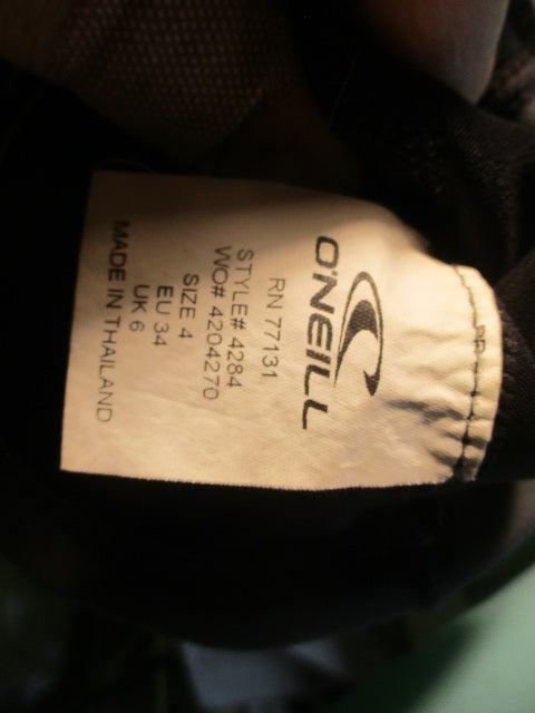 Used Oneill Womens sz 4 top and bottom Wetsuit