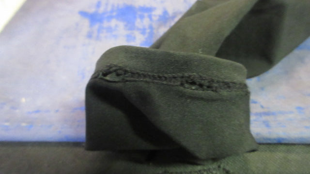 Load image into Gallery viewer, Used Black Arm Sleeve - small tear
