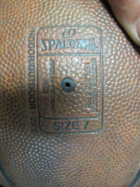 Load image into Gallery viewer, Used Spalding Pro Track Indoor Outdoor Size 7 Basketball
