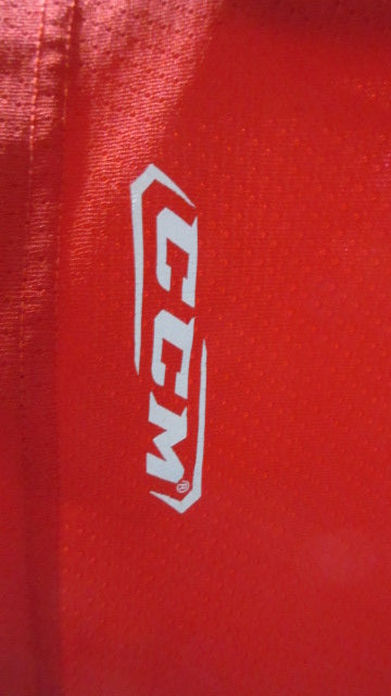 Load image into Gallery viewer, Used CCM #6 Red Hockey Jersey Adult Size XL - wear on shoulder
