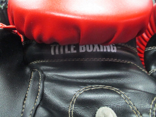 Used Title Boxing Gloves Size Medium (Has Wear)