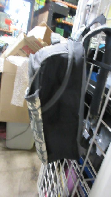 Load image into Gallery viewer, Used Louisville Slugger Backpack - small wear
