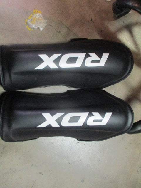 Load image into Gallery viewer, Used RDX T1 Black Size Small Shin Instep Guards (Has wear)

