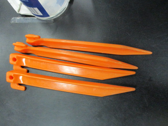 Load image into Gallery viewer, Used 7&quot; Orange Tent Stakes - Set of 4
