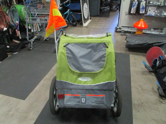 Used InStep Folding Green Bike Trailer (Worn Straps)