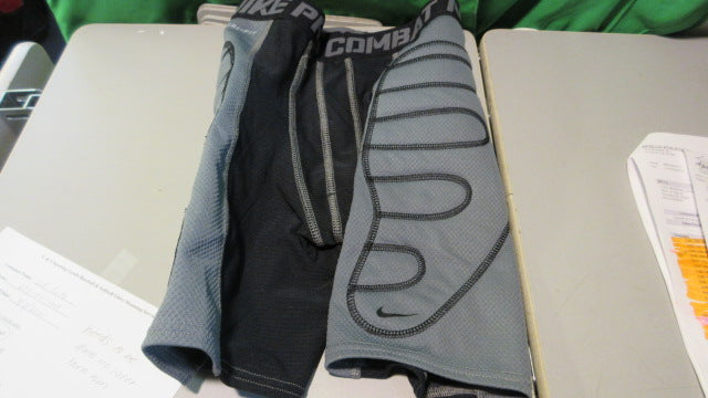 Load image into Gallery viewer, Used Nike Pro Combat Youth Large Padded Compression Shorts
