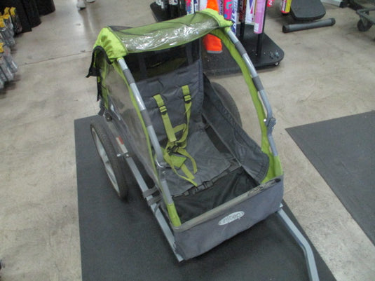 Used InStep Folding Green Bike Trailer (Worn Straps)
