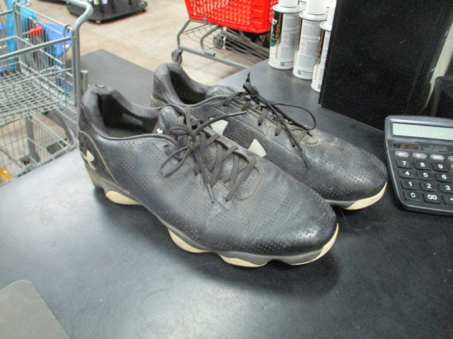 Load image into Gallery viewer, Used Under Amour Cleats in black size 11 wear to bottom spikes
