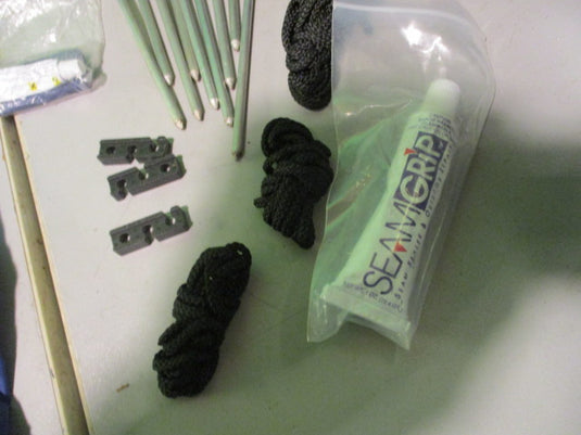 Used Blue Bag of  Tent Stakes Seam Sealant rope and Adjusters