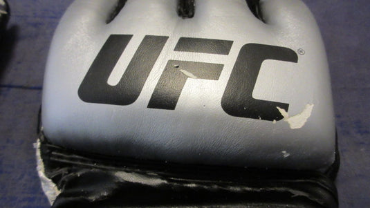 Used The Ultimate UFC MMA Gloves Size Large - heavily worn