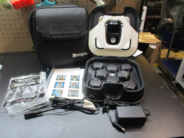 Load image into Gallery viewer, Used Compex USA Tens Unit Muscle Stimulator Kit

