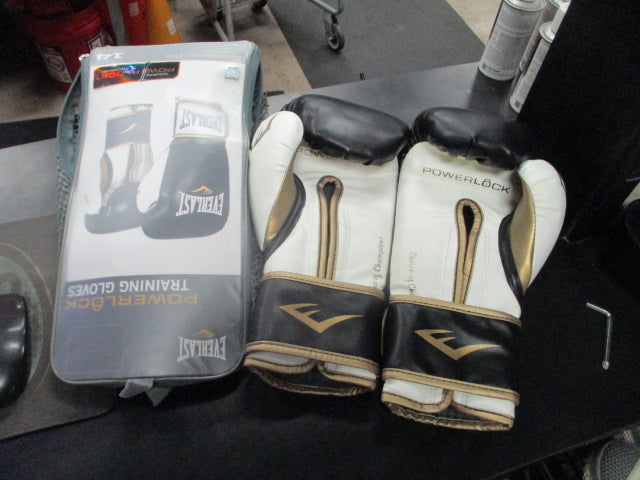 Load image into Gallery viewer, Used Everlast Powerlock Training Gloves in black and gold 14 oz

