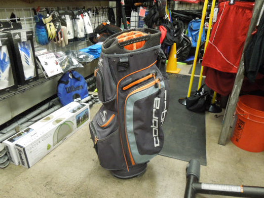 Used Cobra Ultralight Waterproof Cart Bag in Burnt Orange Small Hole i – cssportinggoods