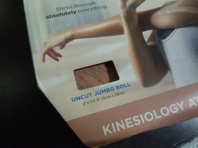 Load image into Gallery viewer, Used Open Box IronMan Uncut Jumbo Roll of K Tape Originally 5 cm x 35 m
