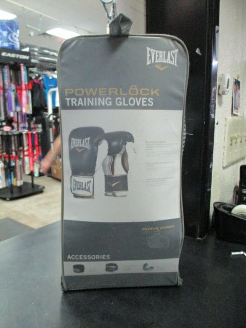 Load image into Gallery viewer, Used Everlast Powerlock Training Gloves in black and gold 14 oz
