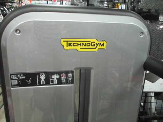 Load image into Gallery viewer, Used TechnoGym Vertical Traction Lat Machine 220lb Stack
