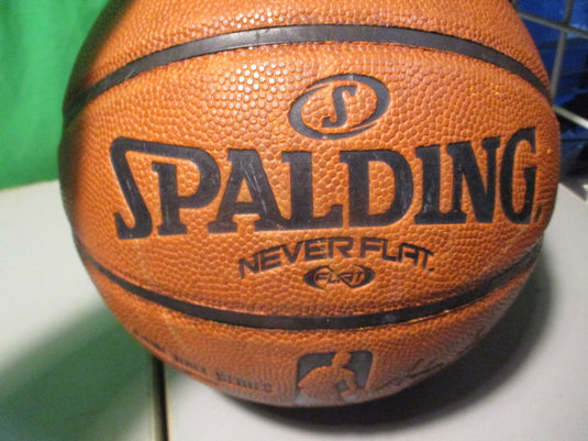 Used Spalding Never Flat Game Ball Series 28.5 Basketball