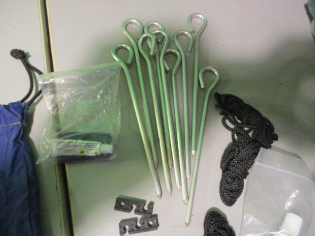 Load image into Gallery viewer, Used Blue Bag of  Tent Stakes Seam Sealant rope and Adjusters

