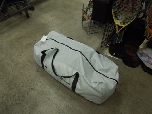 Used Ozark Trail 4 Person Instant Tent with Rain Cover, Stakes, and Carry Bag