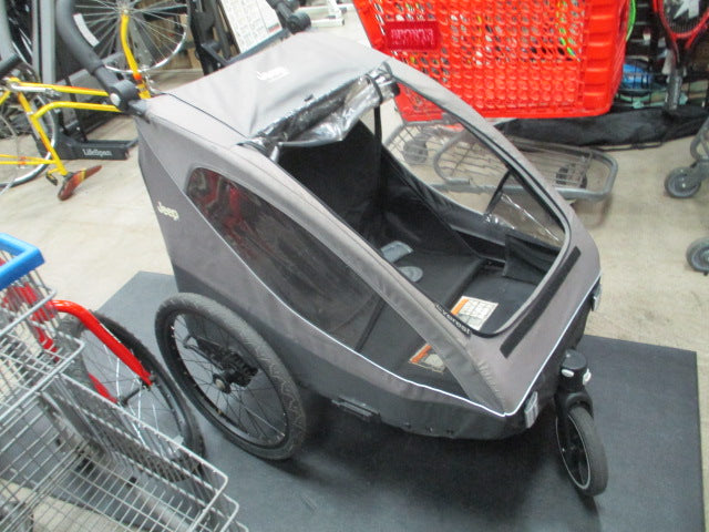 Load image into Gallery viewer, Used Delta Children Jeep Everest 2-in-1 Child Bike Trailer and Stroller

