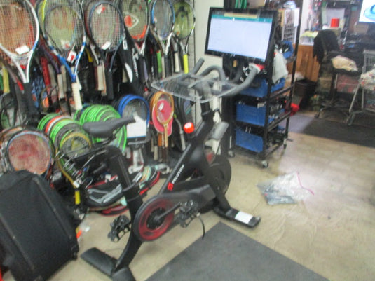 Used Peloton SPIN BIKE With Desk and Pivot Screen