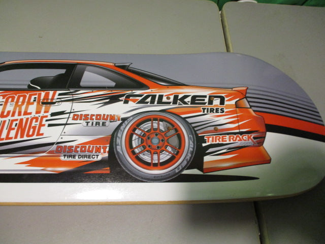Load image into Gallery viewer, Pit Crew Challenge Discount Tire 33&quot; Skateboard Deck
