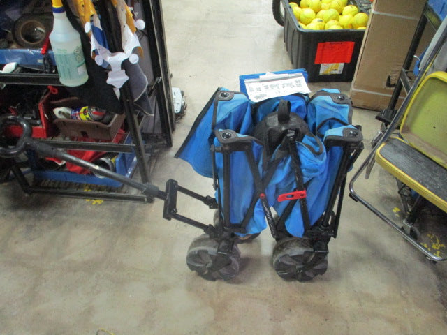 Load image into Gallery viewer, Used ozark trail Blue Wheeled Wagon
