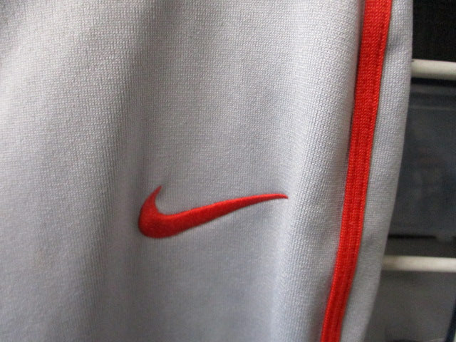 Load image into Gallery viewer, Used Nike Grey Open Bottom w Red Piping Pants Youth Size Large
