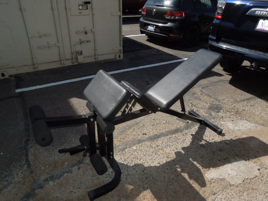 Used Unbranded Adjustable Bench with Leg Ext. Additional parts behind front desk