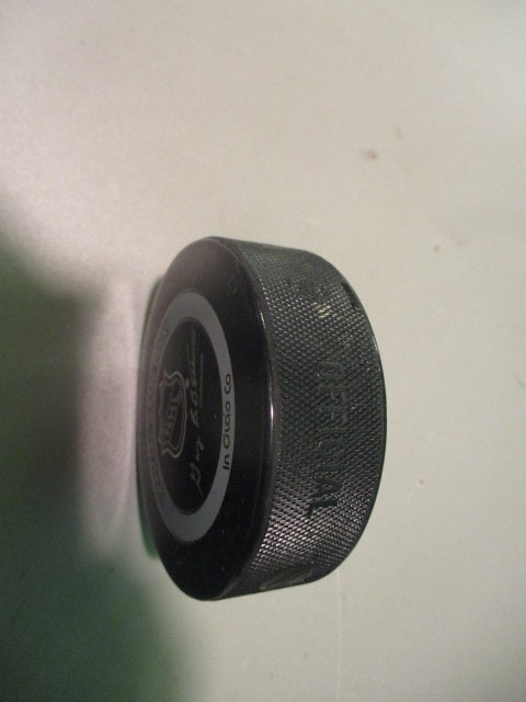 Load image into Gallery viewer, Used Calgary Flames Official NHL Puck
