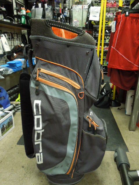 Load image into Gallery viewer, Used Cobra Ultralight Waterproof Cart Bag in Burnt Orange Small Hole in Pocket
