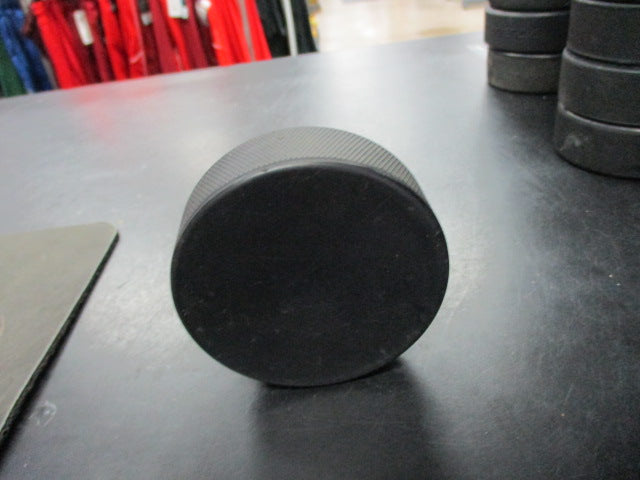 Load image into Gallery viewer, Used Black Rubber Hockey Puck
