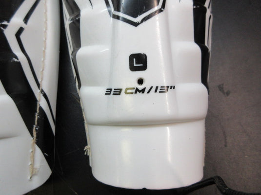 Used CCM LTP Hockey Shin Guards - Youth 13"
