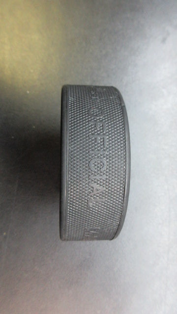 Load image into Gallery viewer, Used Rubena Official Hockey Puck
